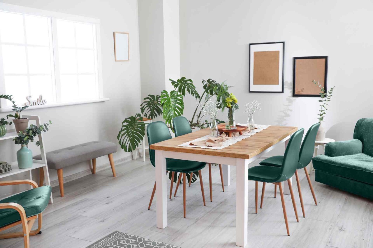  A modern dining room with green accent furniture near Amarillo, Texas (TX)